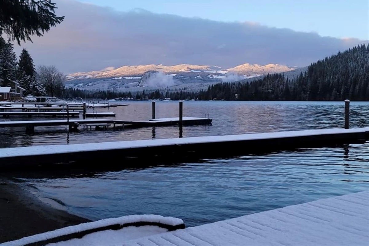 Snow blanketing the lakeside docks.