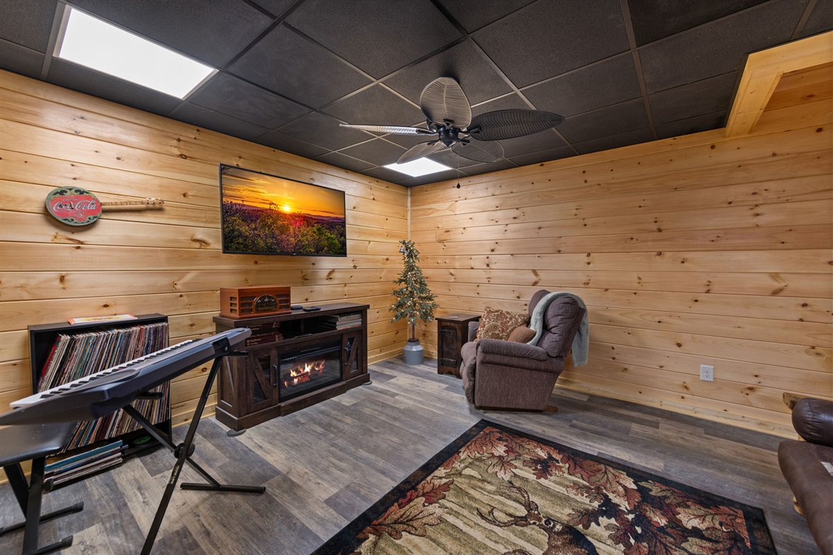 Cozy up by the fireplace and enjoy the ambiance of relaxing music.