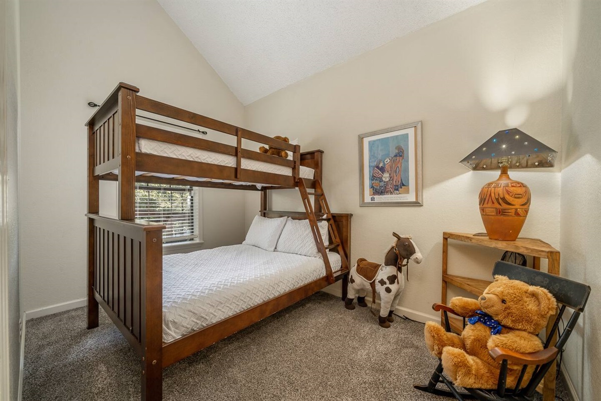 For the youngsters and the young at heart a bunkroom with Full bed (double) and twin sized upper.  -Bunkroom