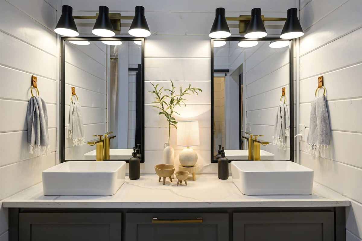 Indulge in luxury with our designer double vanity featuring sleek vessel sinks. Elevate your morning routine in style