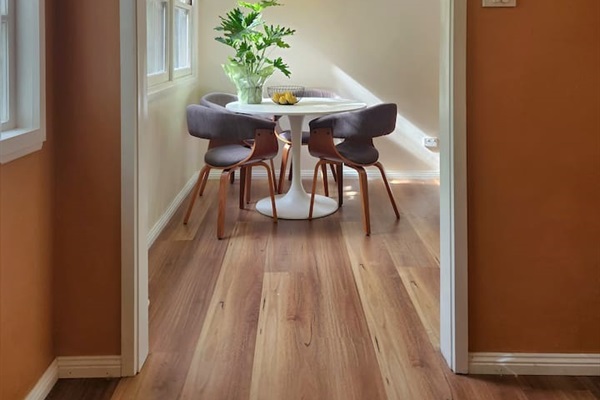 In addition to the large dining table, a 4-seater kitchen eating space is also available. This space doubles as a work area too, with power close by.