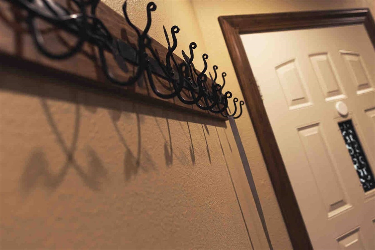 Coat hooks by the front door