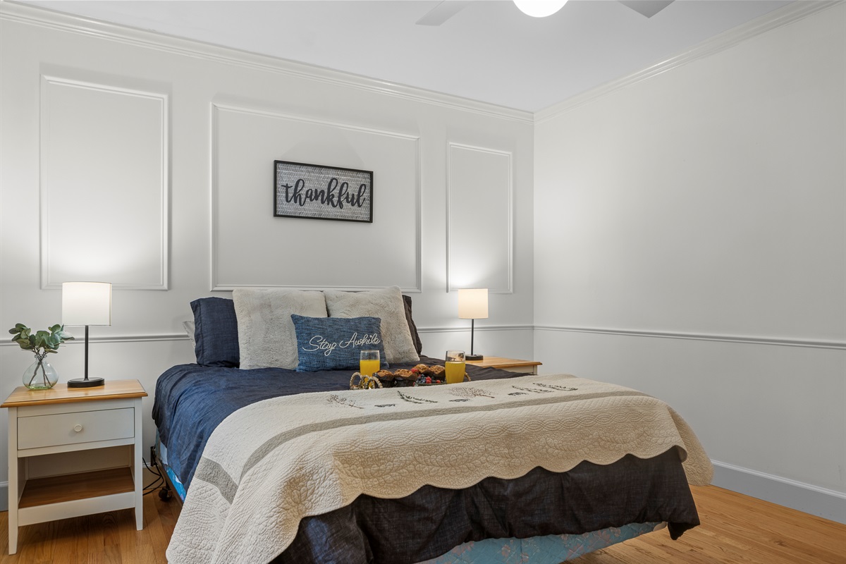 Queen Bedroom 2: Enjoy modern decor and tranquility in this inviting space for restful nights!