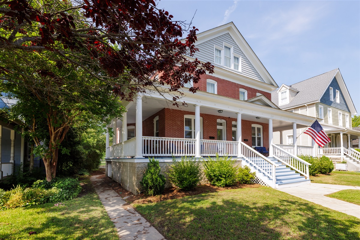 Guests can enjoy the large wrap around porch and its lounge furniture.