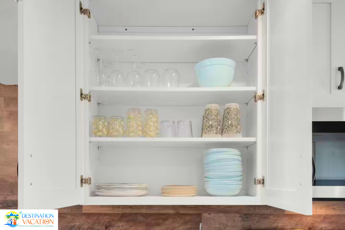 Beautifully organized dishware adds charm to the kitchen.