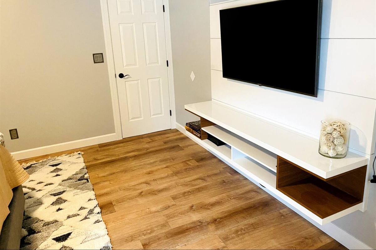 One of three flat screen TV's