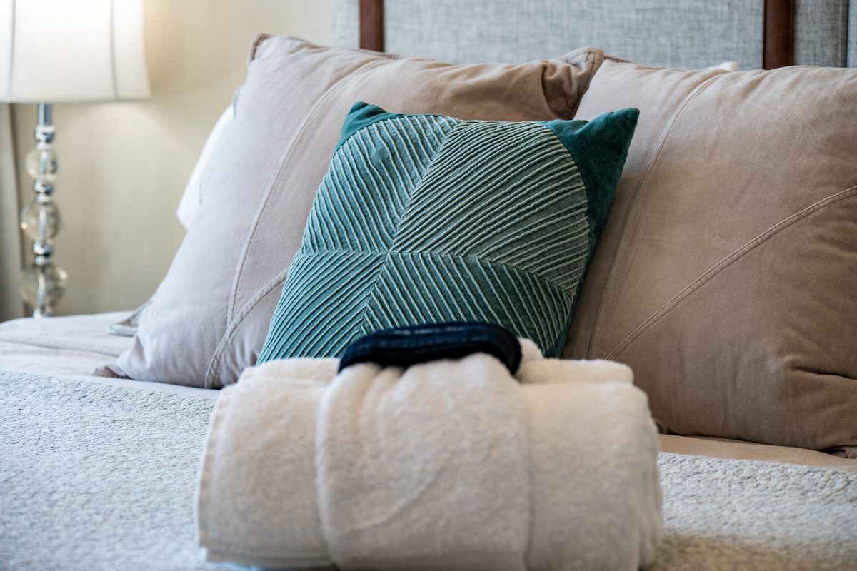 Thoughtful touches and luxurious linens create a welcoming retreat for a restful night's sleep.