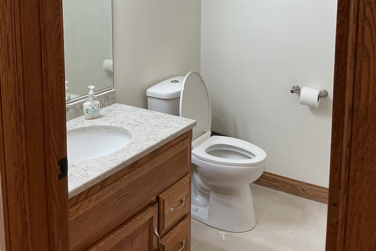 Additonal 1/2 bathroom on main level hallway near pool entrance and kitchen