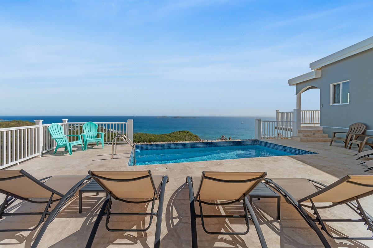 Another view of the pool area showing ample seating and privacy.