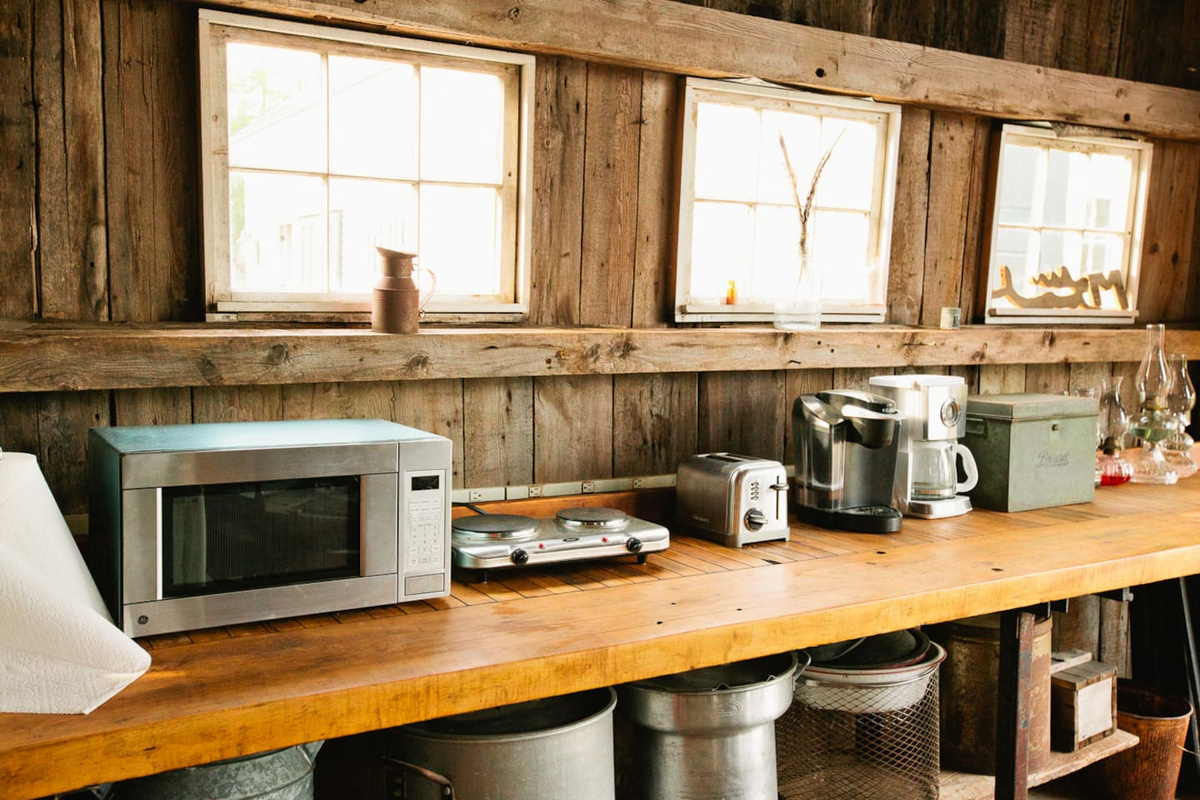 Microwave, toaster, coffee maker, it is all there. Super sized pots for lobster and clams.