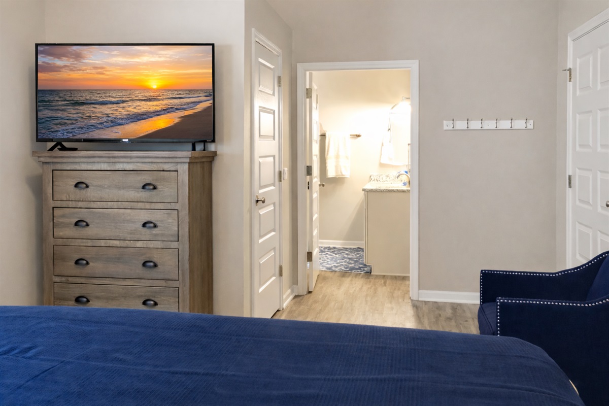 Primary King Bed, Ensuite bath, and TV