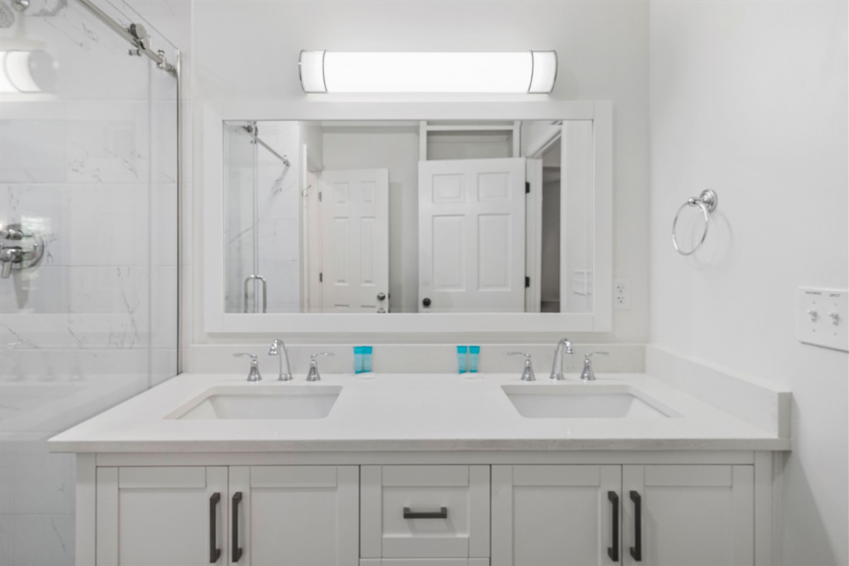 Primary Ensuite Bathroom 1 With Dual Vanities | IOP Escapes Beach Blessing | 3705 Hartnett Blvd, Isle of Palms, SC