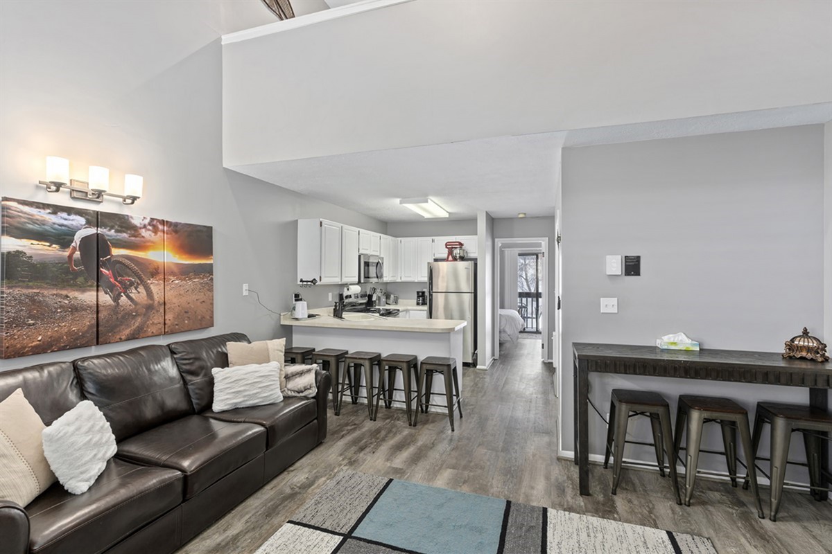 Spacious living area flowing into dining and kitchen—perfect for entertaining and family time.