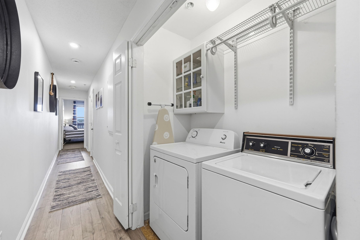 A convenient laundry area with a full-size washer and dryer to make your beach stay effortless.