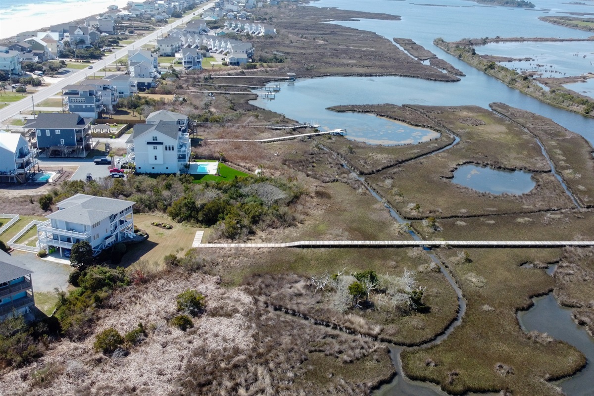 Aerial view of the marsh and boardwalk leading to the private dock