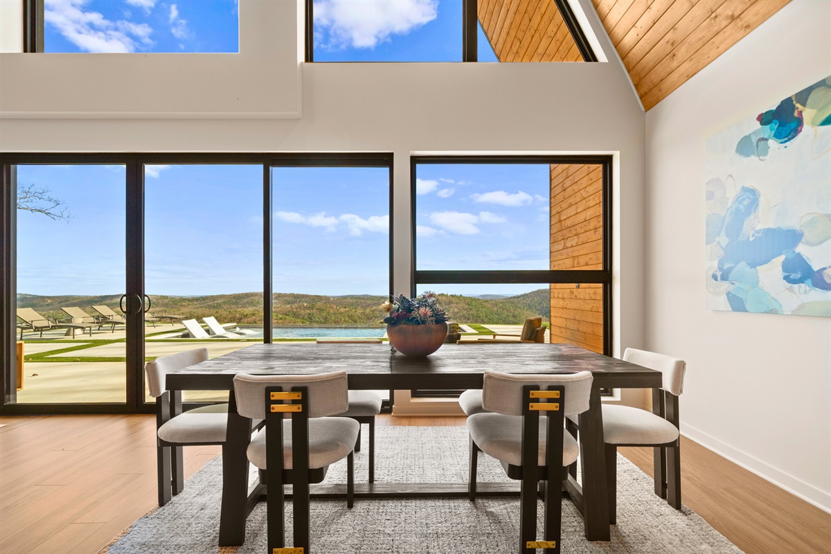 Enjoy gathering around this table with plenty of space for everyone, plus a view outside that makes even a simple meal feel a little more memorable.