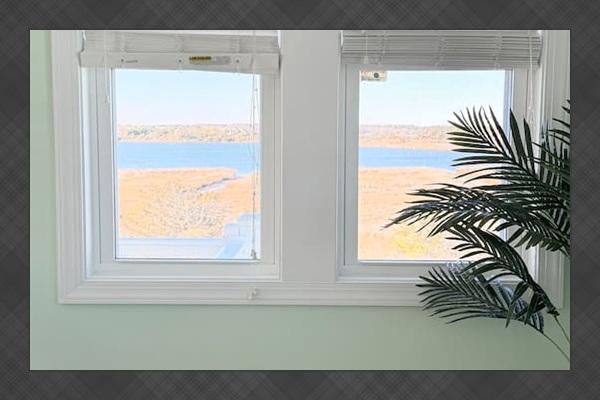 Sitting on the couch enjoying coffee with water views of the sound. Or enjoy the water views from the front back, top and bottom decks!