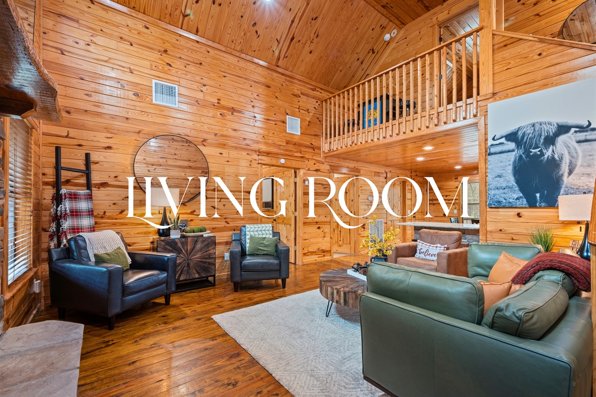 Walking into the living room, you’re welcomed by warm wood tones, plush seating, and a space that feels both cozy and open for gathering.