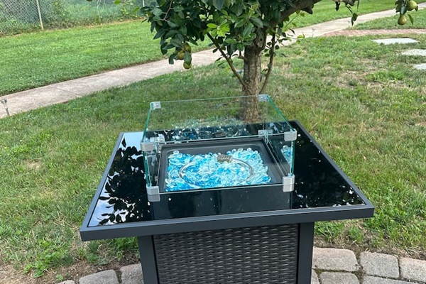 Propane fire pit-  grab the chairs off shed deck or the beach rug from outdoor storage bin and hang by the fire