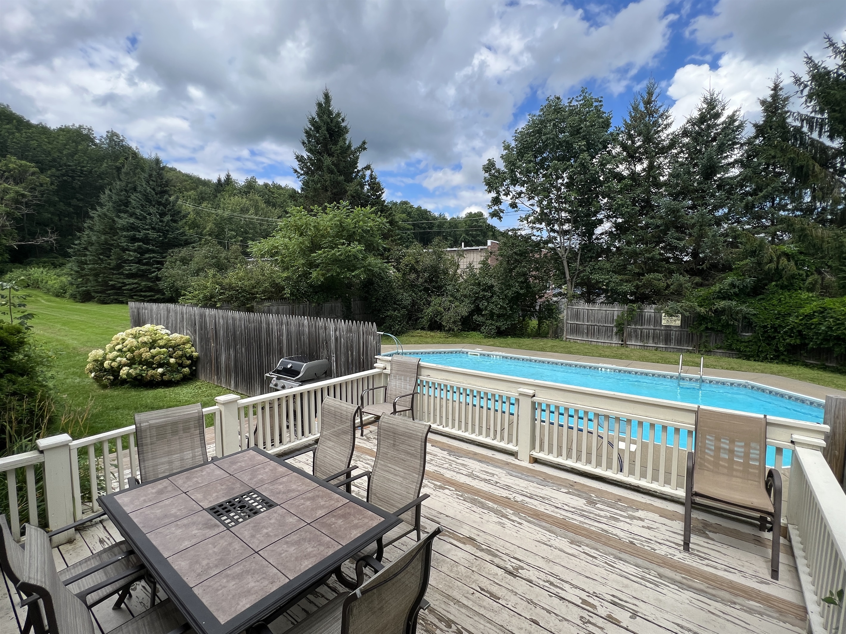 The Federal House side deck off kitchen leading to grill area and pool.