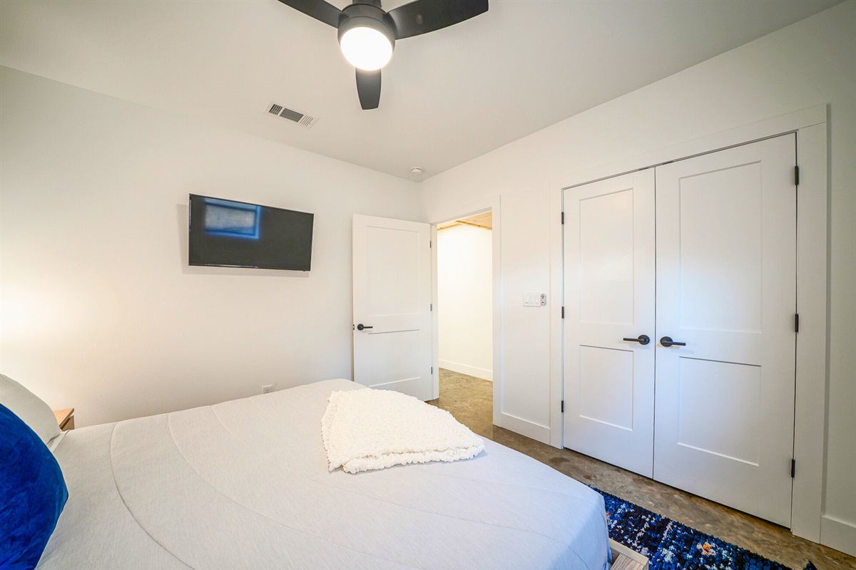 Plenty of storage, clean lines, and modern touches make this a favorite guest room for style and space lovers alike.