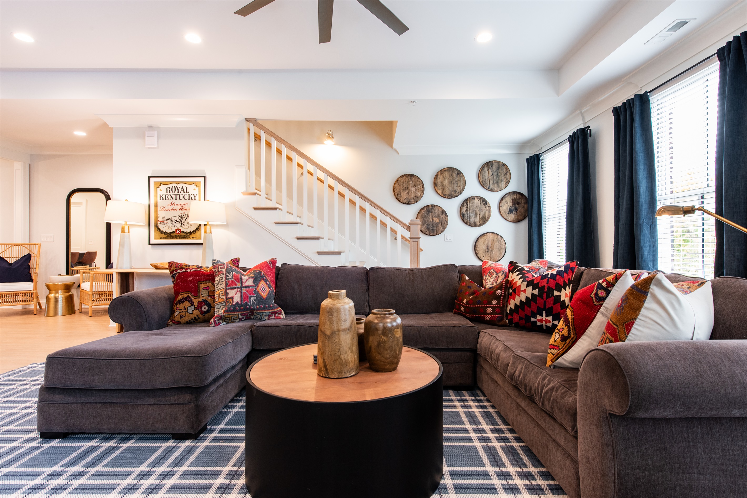Settle into this inviting living room, ideal for bourbon trail explorers. Enjoy the plush seating, admire the bourbon-inspired decor, and relax with friends or family after a day of distillery tours. A perfect blend of comfort and Kentucky charm!