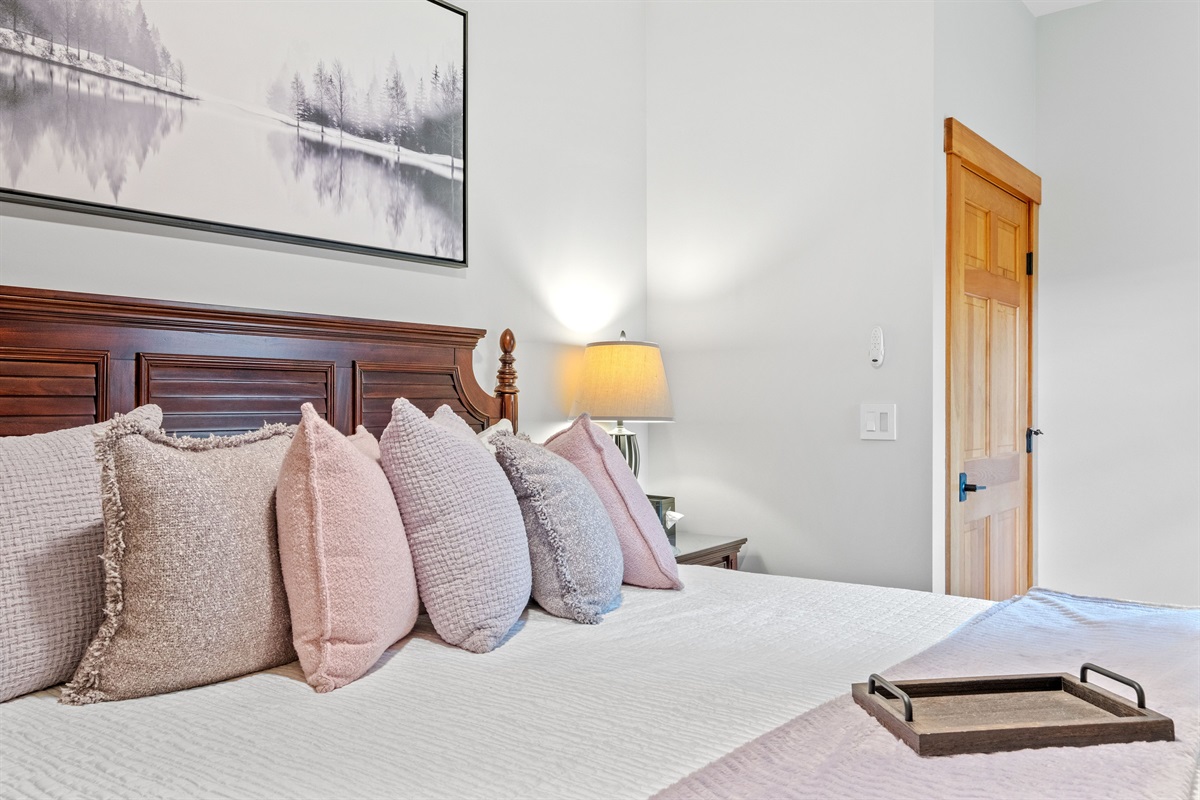 Second floor ensuite bedroom with king bed and its own full bath