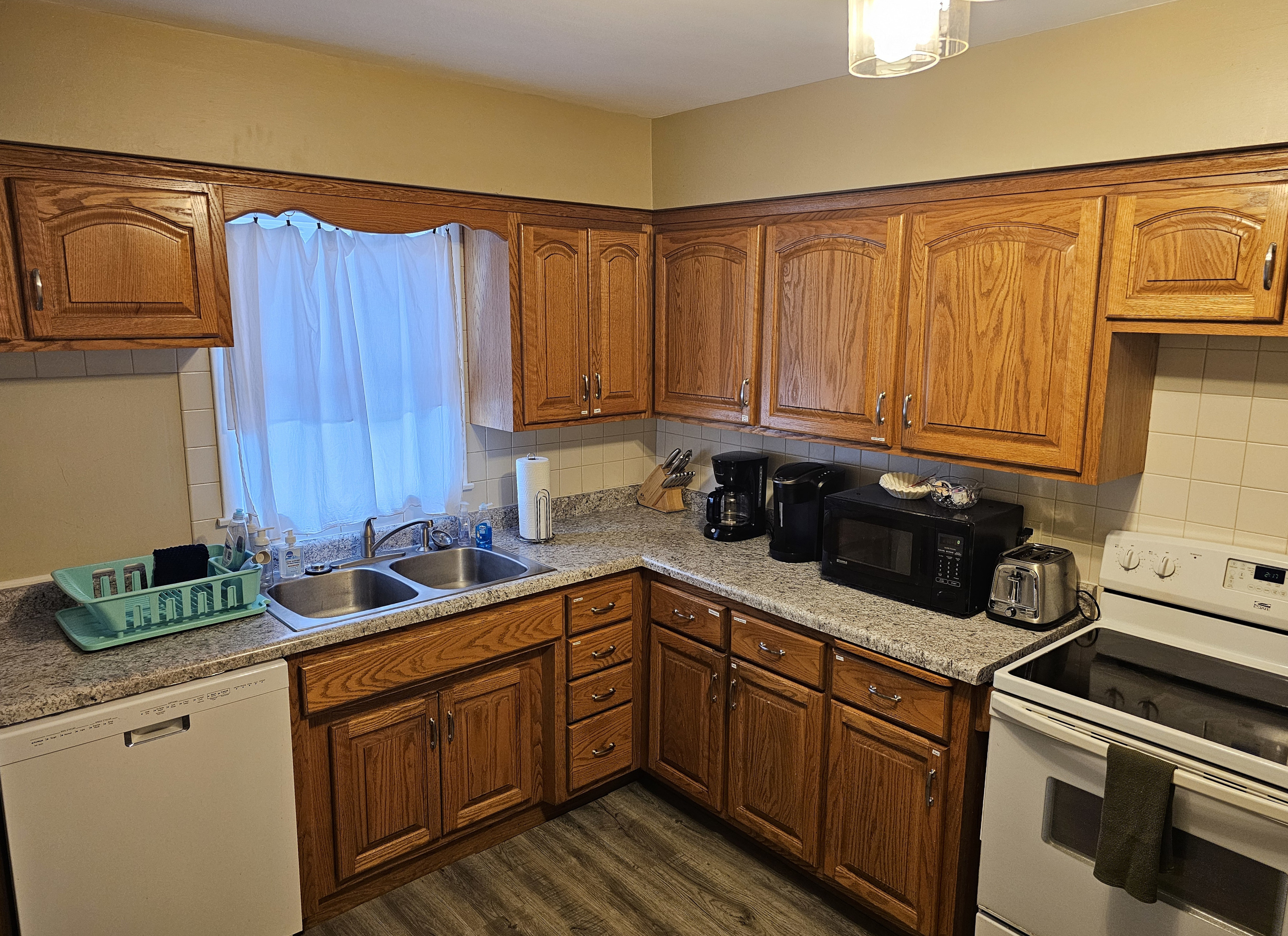 Full kitchen with stove, refrigerator, dish washer, microwave, coffee makers, pots/pans, and most other essentials.