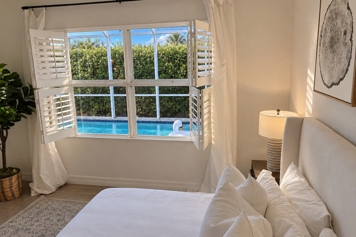 Good morning from paradise. Wake up to the warm glow of the Florida sun in one of two beautifully appointed primary suites, designed for ultimate comfort and privacy.