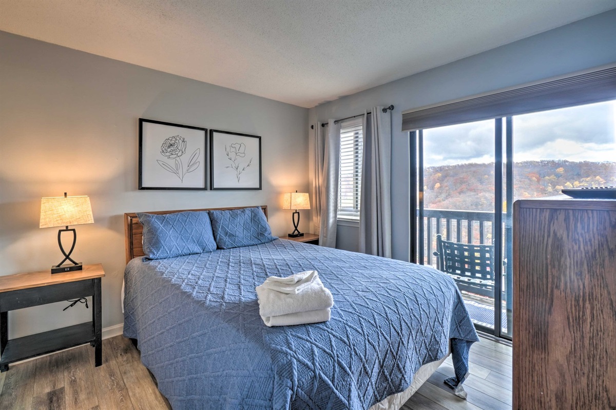 Bedroom #1 with en suite bathroom & balcony access