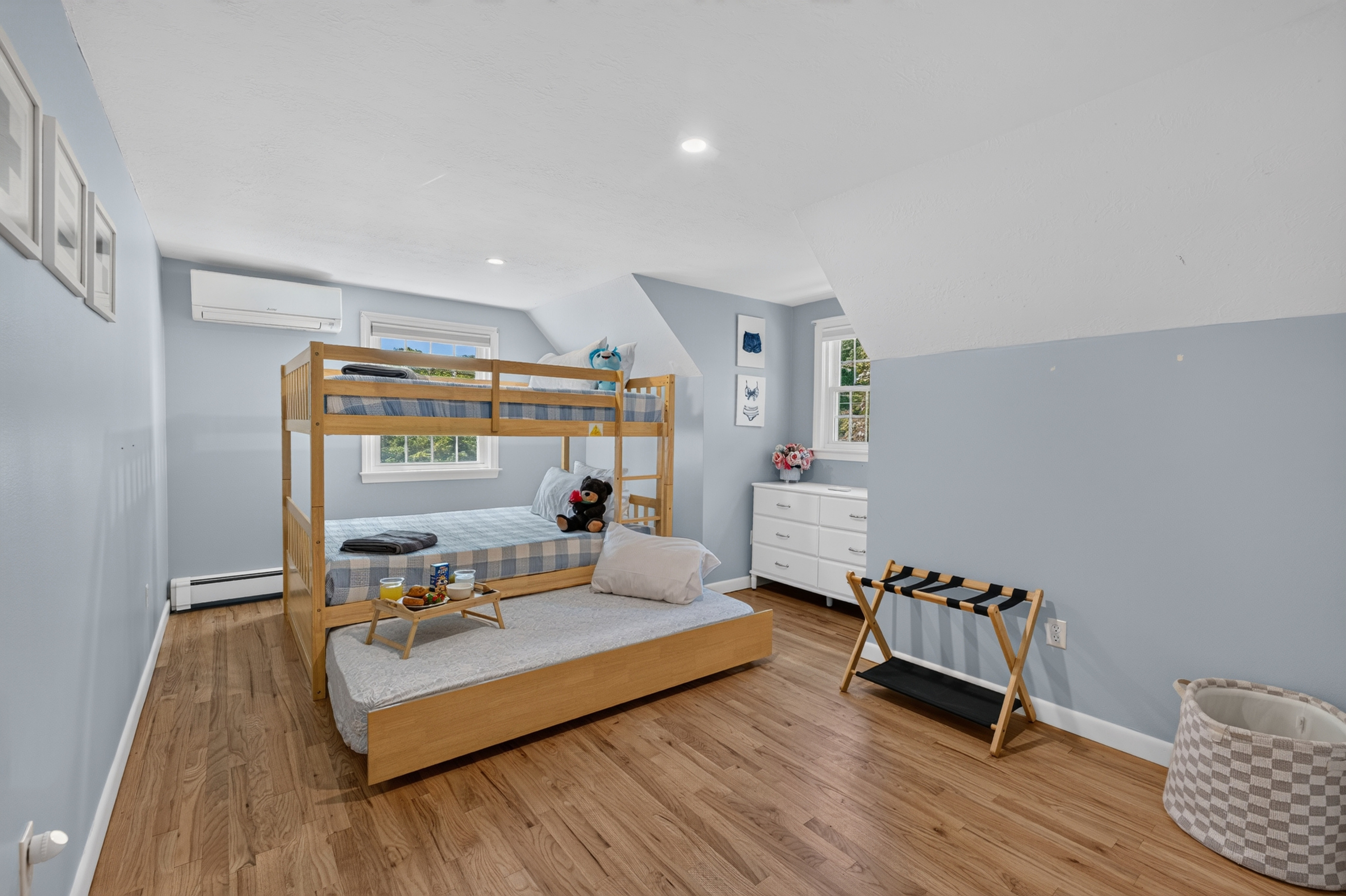 Family-friendly bedroom featuring bunk beds and plenty of space to spread out.