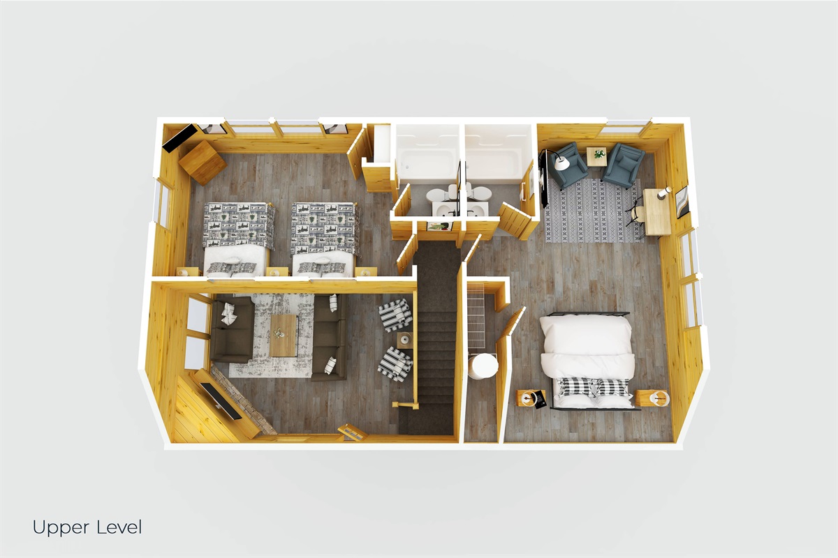 The upper level includes the primary bedroom (complete with king bed and a sitting area) and a second bedroom that includes 2 queen beds.