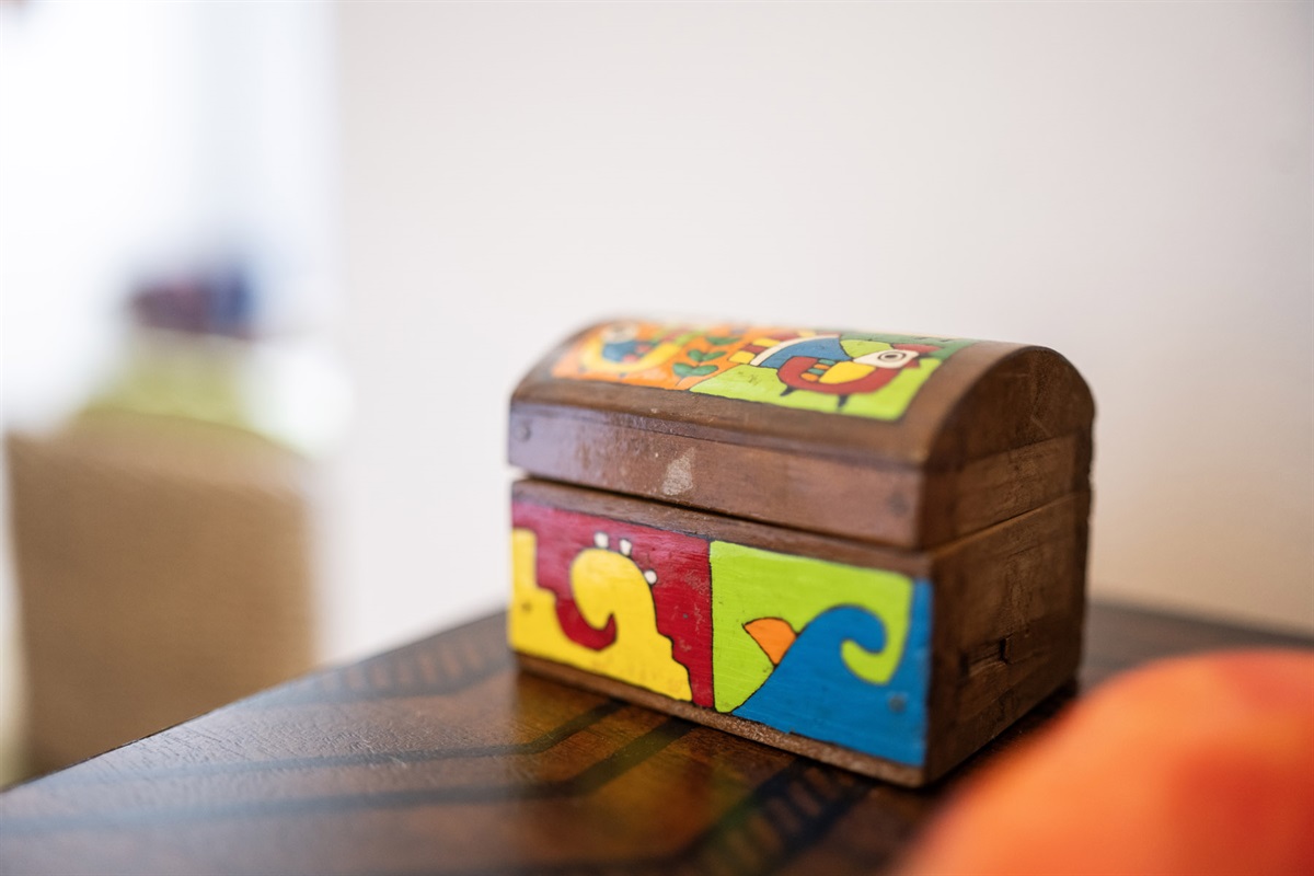 Store your travel essentials with ease in the decorative bureau.