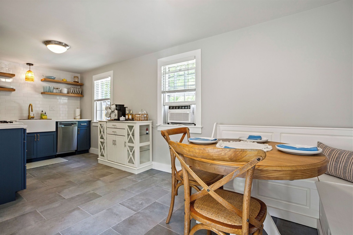 Enter into the kitchen from the sunroom. 
