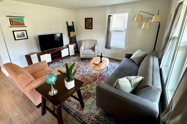 Imagine curling up in this cozy living room for a movie night or perhaps a family game night. We offer board games for our guests to enjoy during their stay with us! 