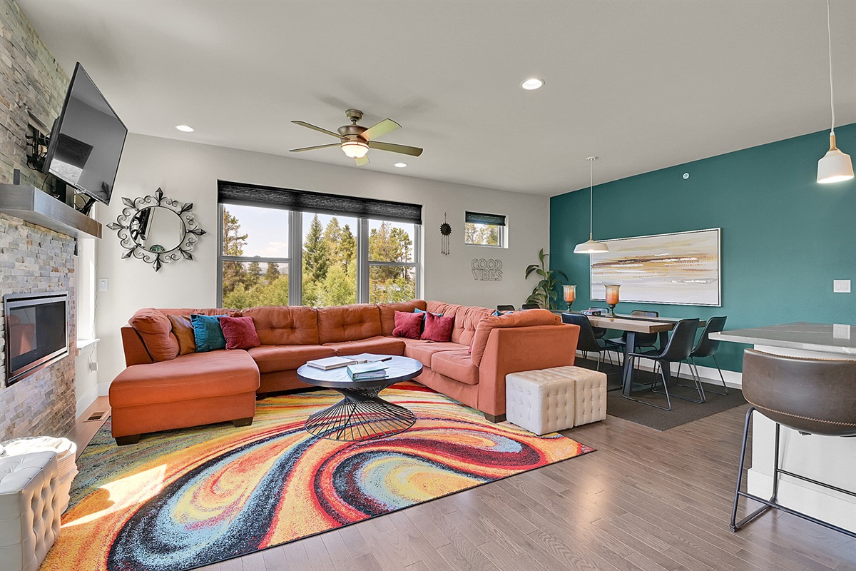 A large living room is connected to the kitchen and dining areas to maximize the festivities!