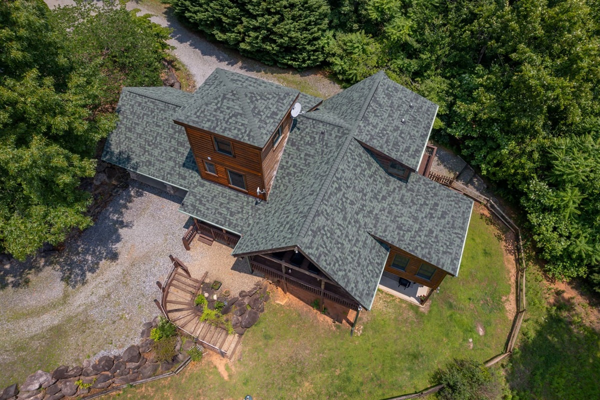 Aerial view of cabin and surrounding area.  Property sits on 2 acres of privacy!
