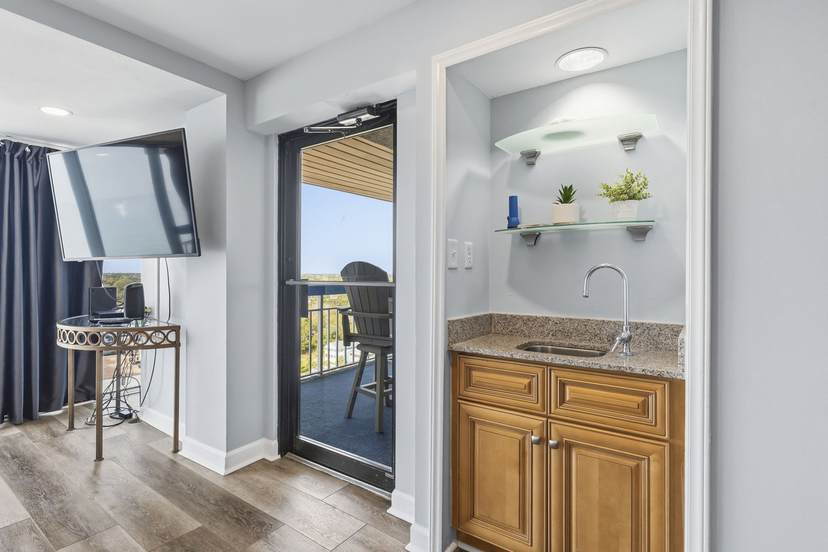 Wet bar beside the balcony door