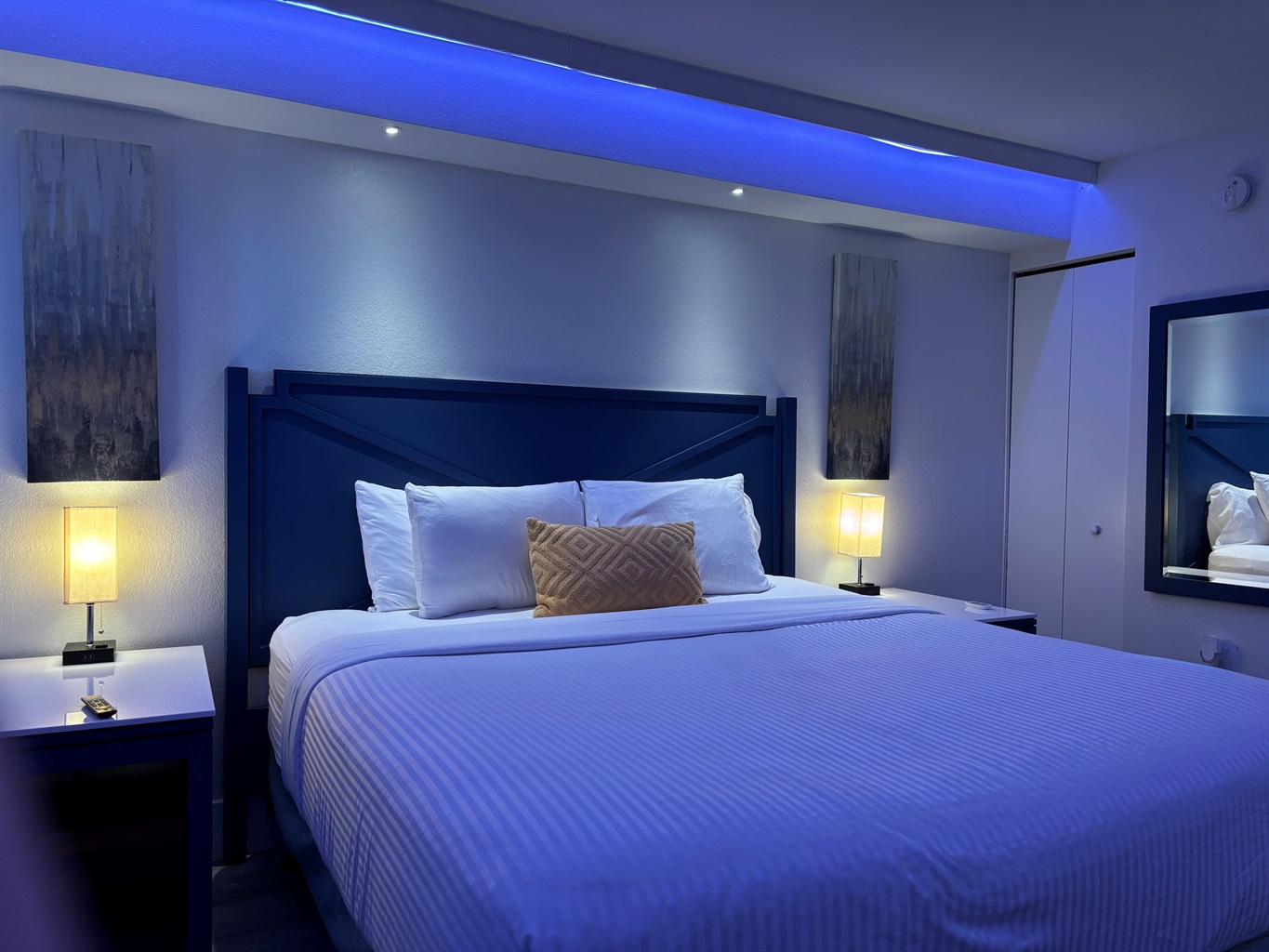 Crisp linens and LED lighting you can change color.