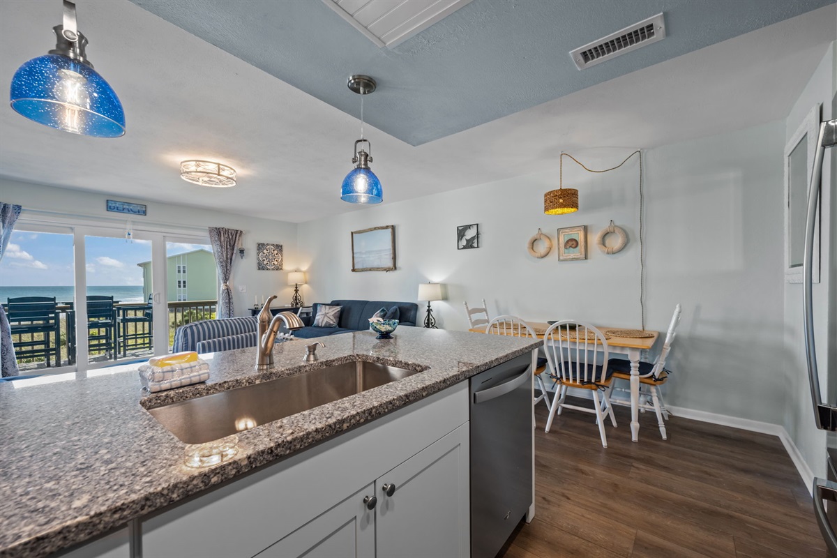 Open kitchen and dining layout that keeps everyone connected while cooking and relaxing