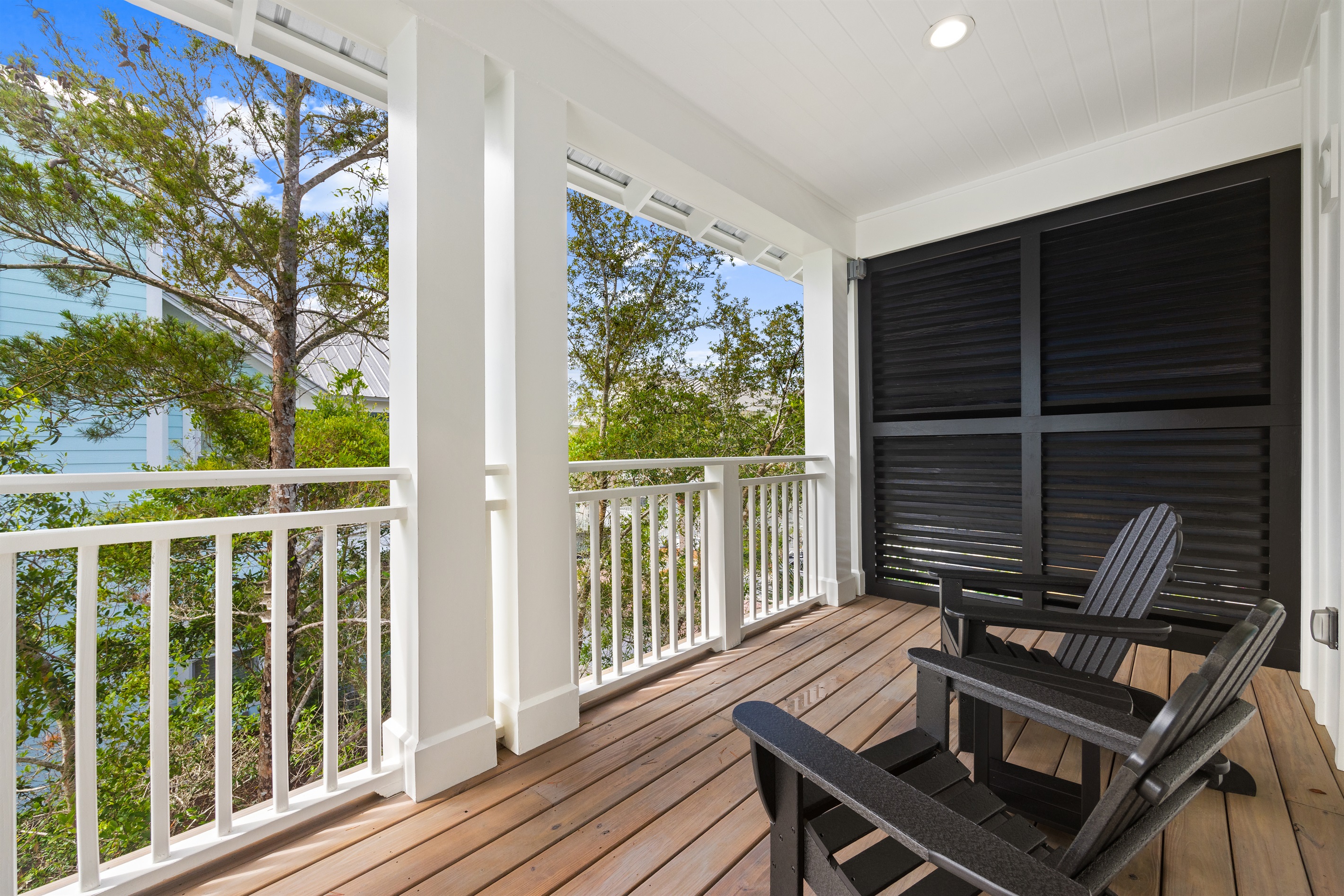 A peaceful outdoor retreat (off of the upstairs master) for morning coffee, evening conversations, or simply enjoying the coastal breeze.