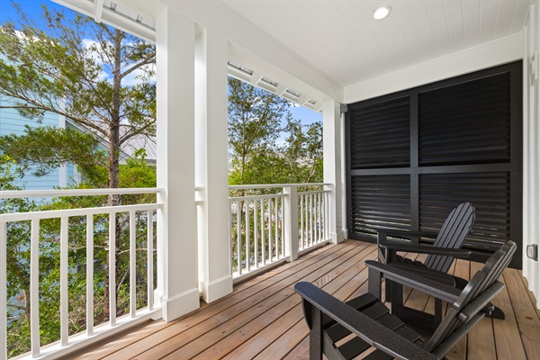 A peaceful outdoor retreat (off of the upstairs master) for morning coffee, evening conversations, or simply enjoying the coastal breeze.