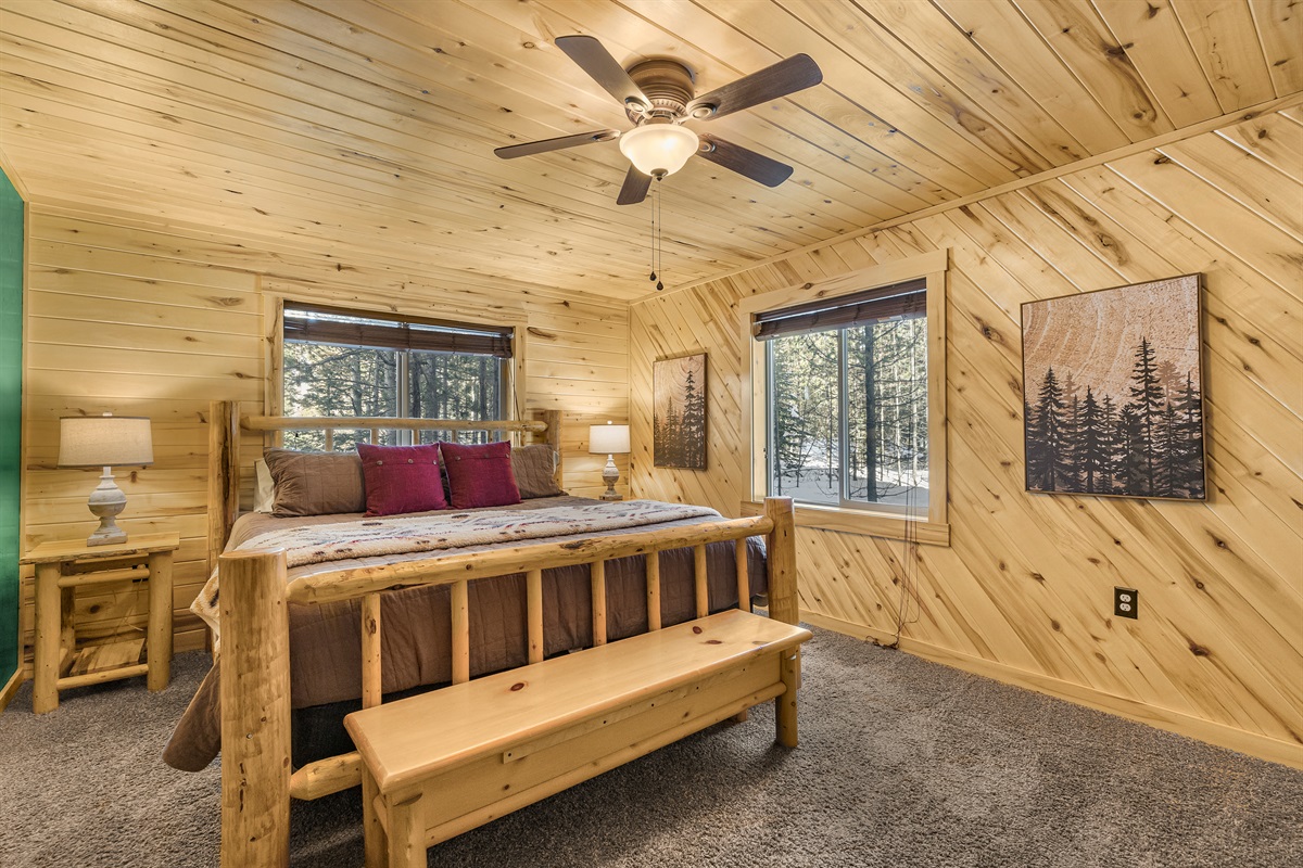 Master bedroom w/ king sized bed and private ensuite bathroom