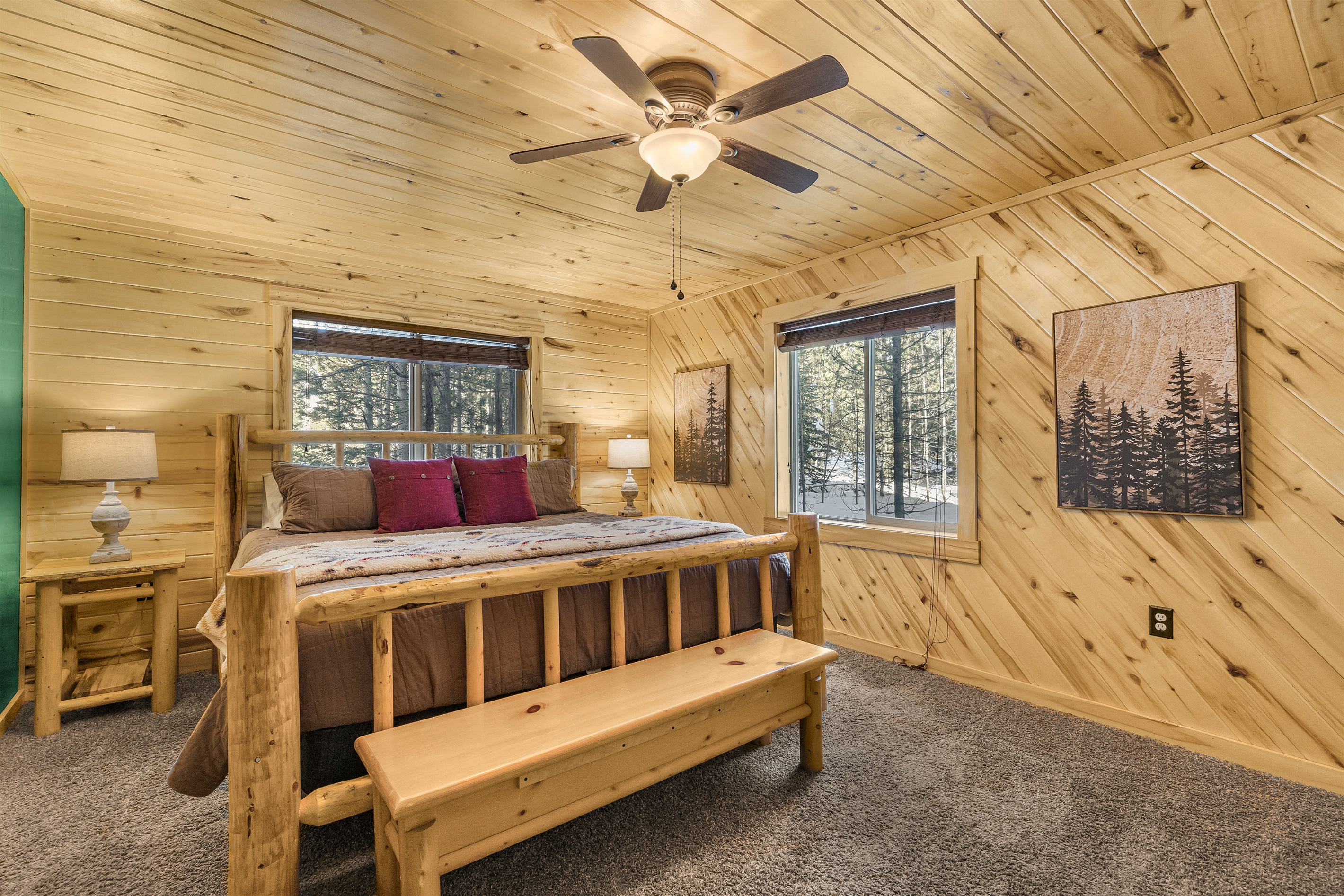 Master bedroom w/ king sized bed and private ensuite bathroom