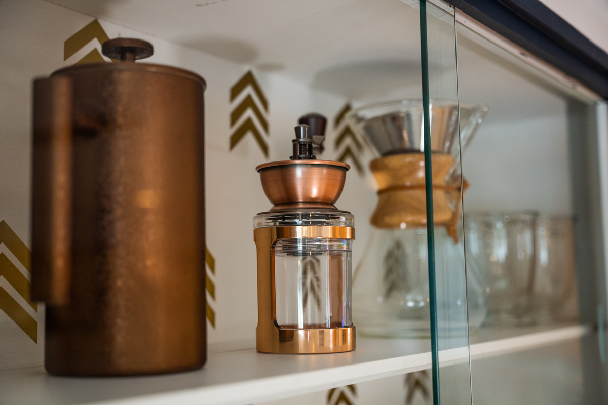 The coffee bar has a hand grinder, pour through coffee maker and French press.  