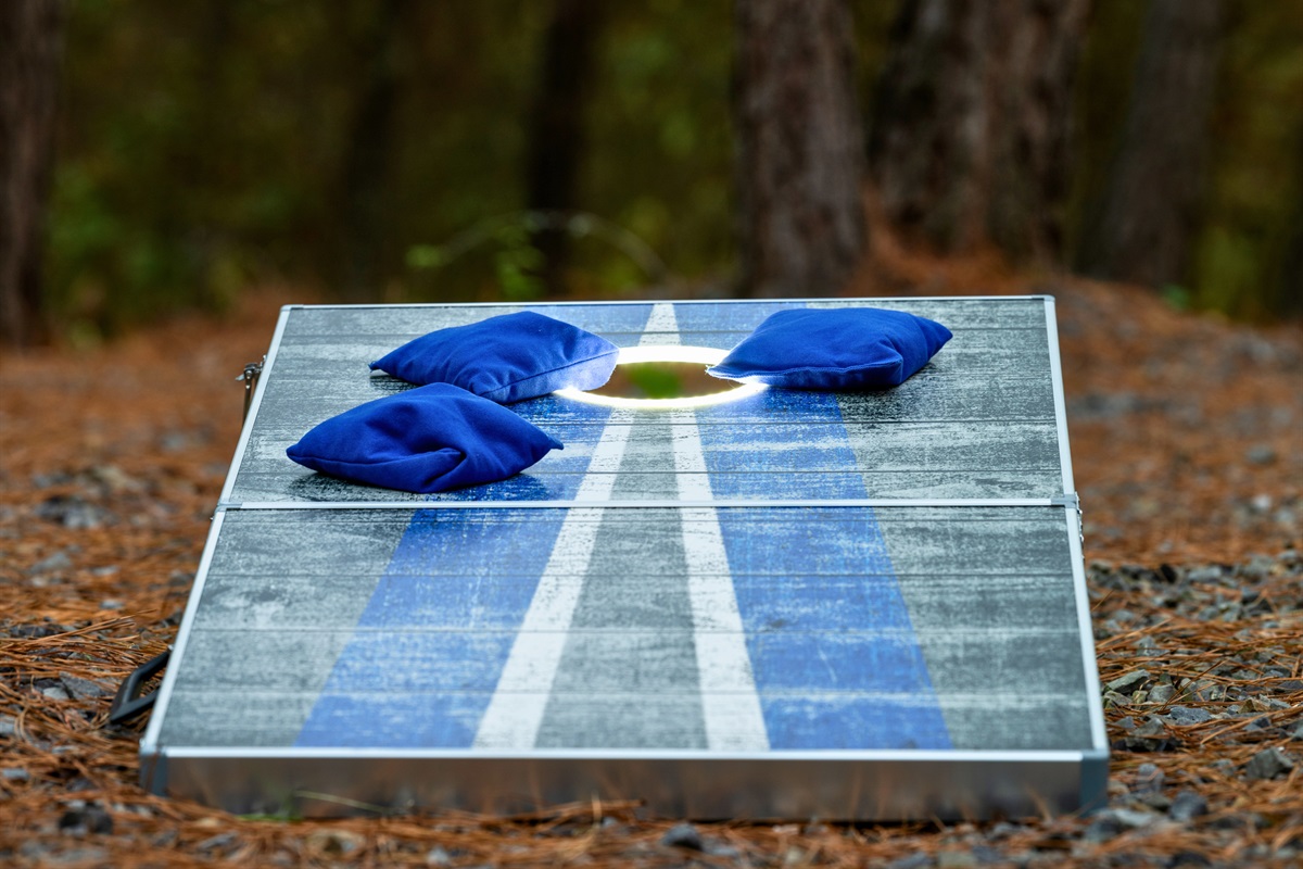 A little outdoor competition adds to the fun—cornhole is always a hit with guests of all ages.