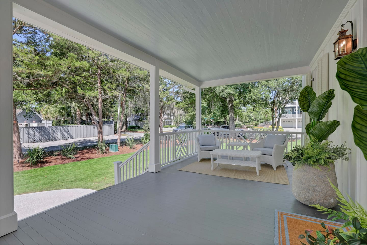 Welcoming, spacious, shady covered front porch!