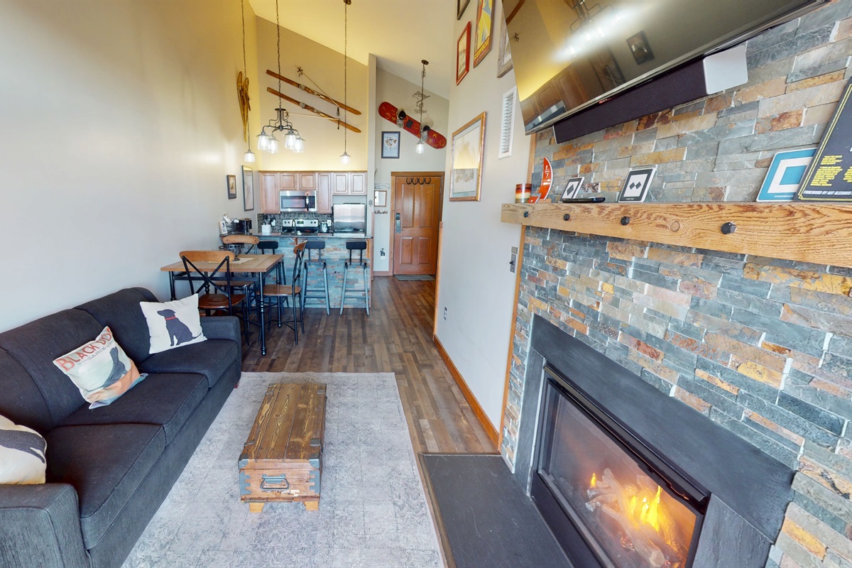 Vaulted ceilings, ski lodge décor, and natural light make this space your Snowshoe retreat.