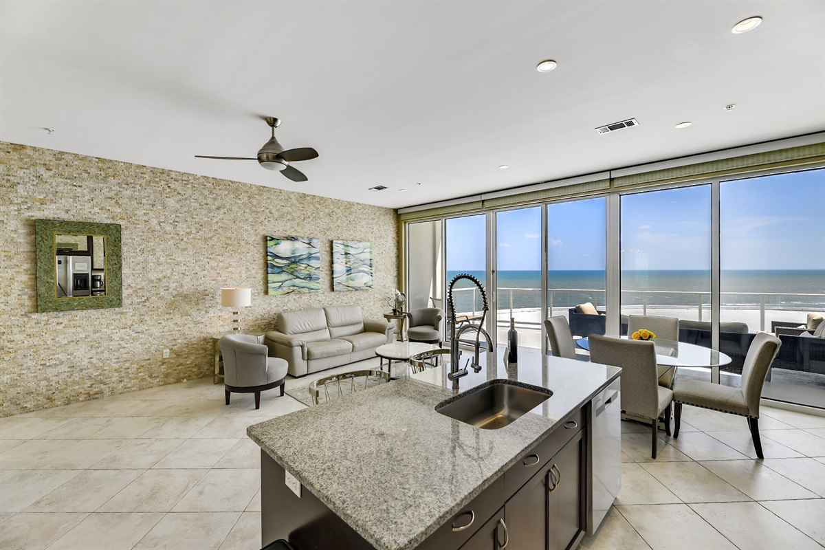 200 sq ft living room with beautiful stone tile.  Plenty of room to spread out!