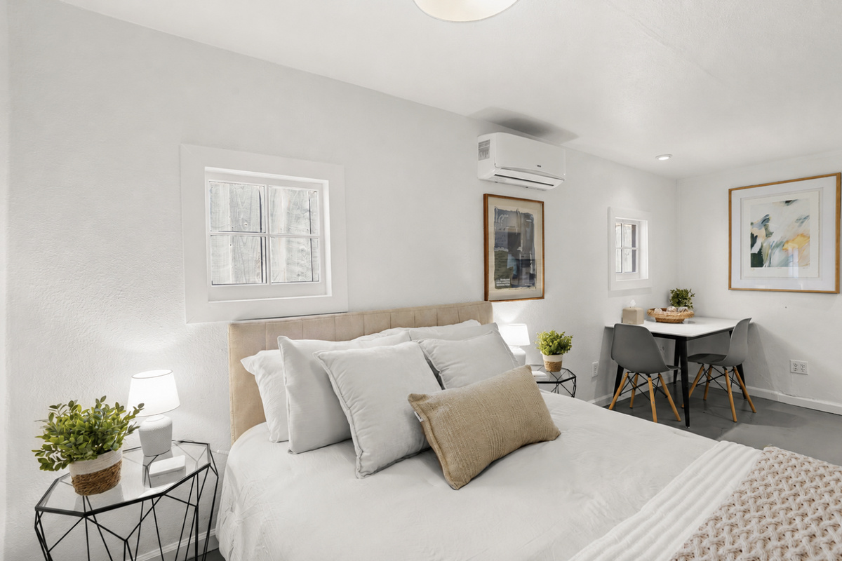 A second inviting queen bedroom perfect for couples or family